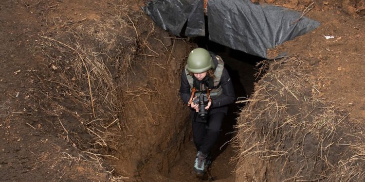 Olha Kovaliova while working in the Donetsk Region in June 2024. Photo by Heorhii Ivanchenko