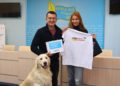 Sergiy Tomilenko presented Olha Chervakova with an NUJU T-shirt reading Journalists Are Important, a full set of the Union’s human rights booklets, and a selection of frontline newspapers. Olha came with her dog Noris. Photo by NUJU