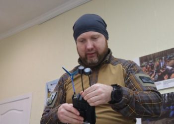 Military Correspondent Volodymyr Pavlov inspects the received detector